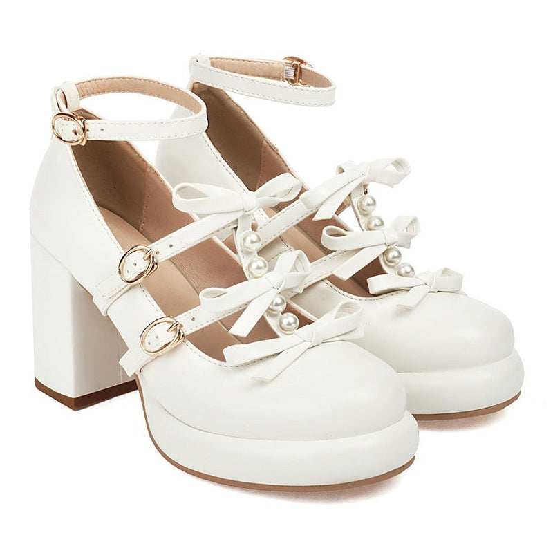 White version of the same design with chunky heels and platform, shown side-on.