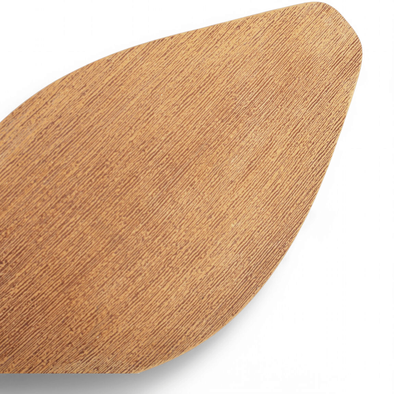 Close-up of caramel-coloured toe sole with wood-grain texture.

