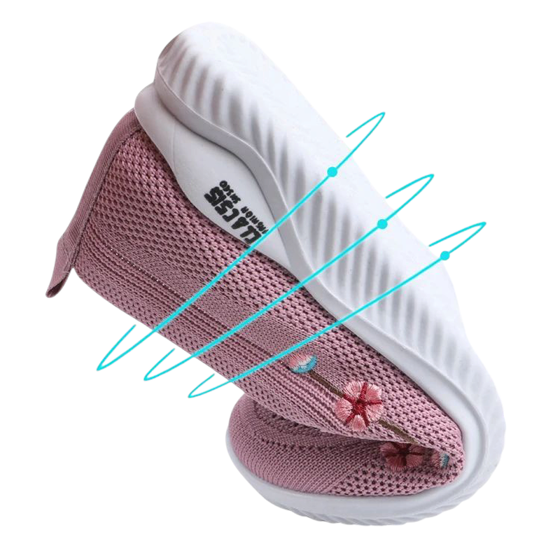 Shoe bent in half to demonstrate its highly flexible rubber sole.