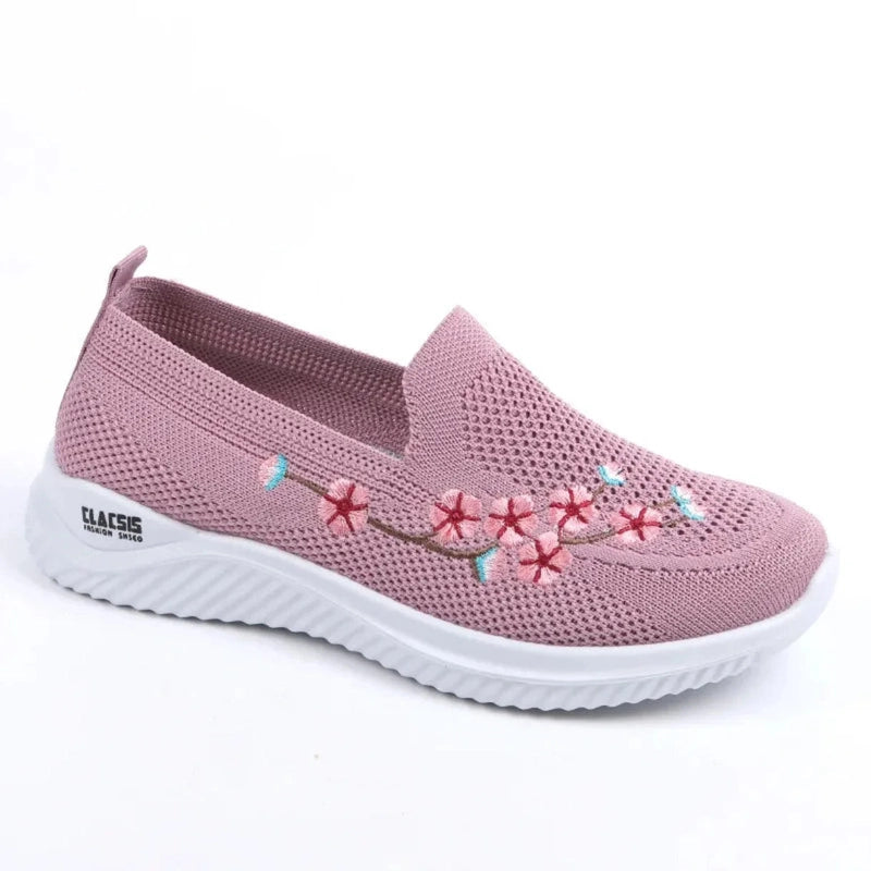 Full product shot of the pink square‑toe floral knit loafer on white background.