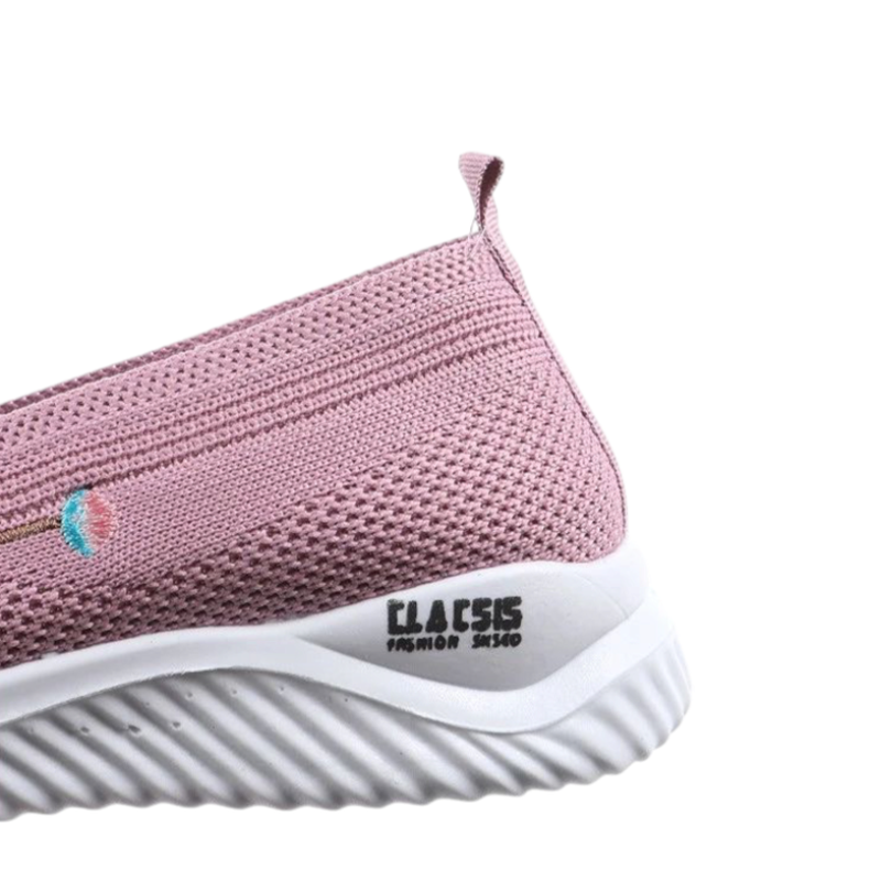Alternate angle of the side logo and breathable knit texture.