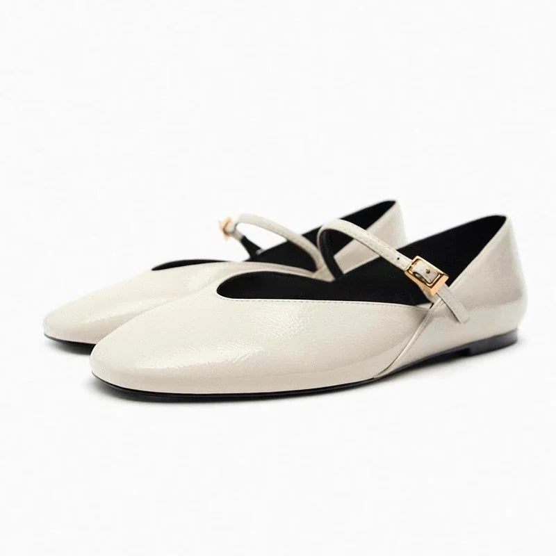 Merendy Dallas Beige Mary Jane ballet flats with bold glossy leather finish, round toe design and front view showing strap and buckle