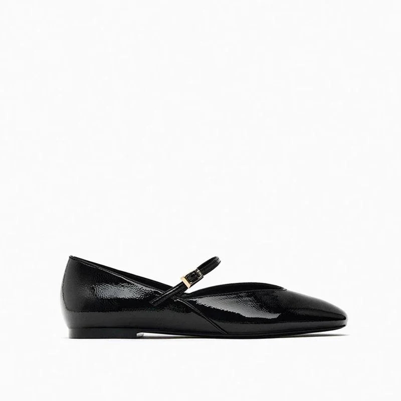 Side view of Merendy Dallas Mary Jane ballet flat in black with glossy leather and round toe design