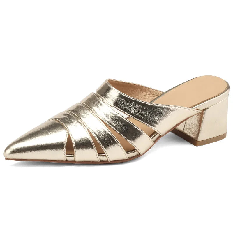 Side view of Merendy Sortara gold metallic genuine leather mules with pointed toe and mid chunky heel
