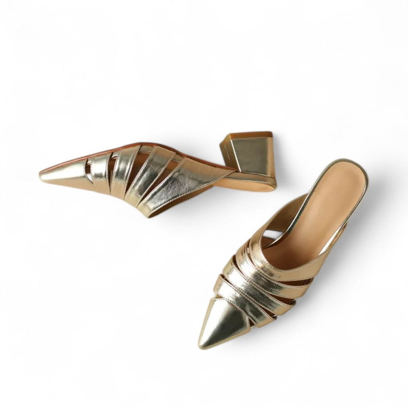 Front view of Merendy Sortara gold metallic mules – one shoe angled, one facing forward