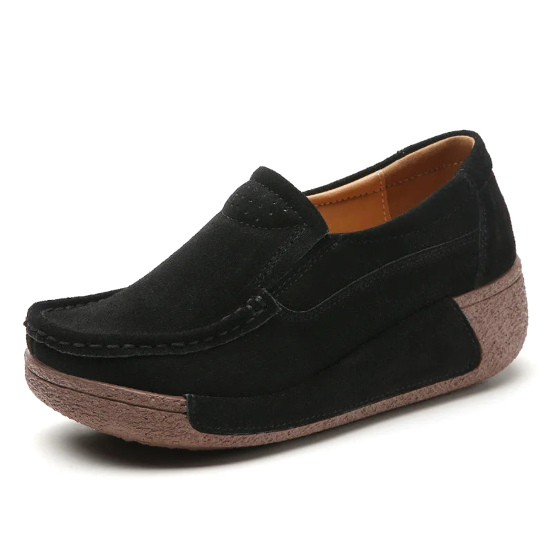 Black suede platform loafer side view.