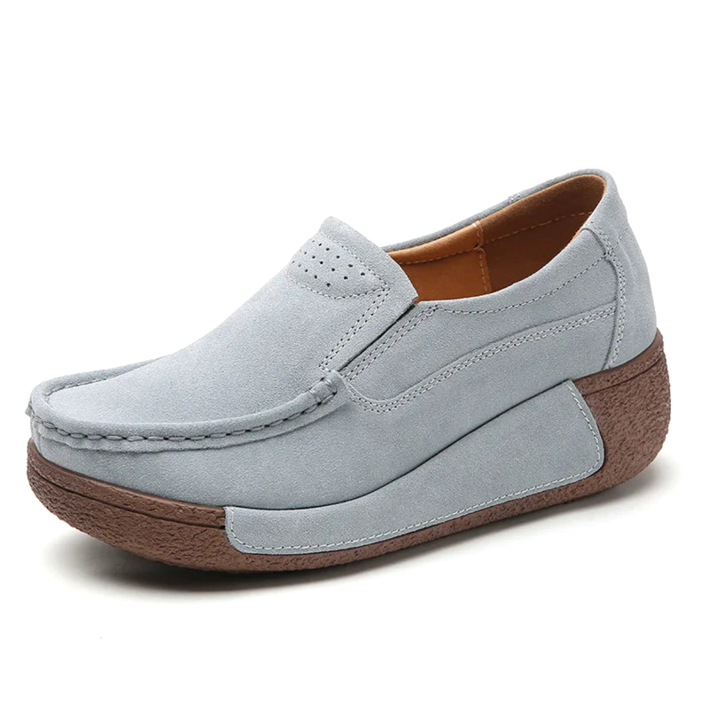Light‑blue suede platform loafer on white background.